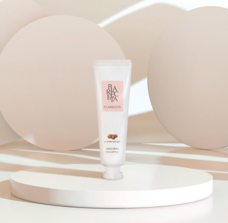 BONNY & J Plareceta Hand Cream with 20% shea butter and placenta extract, standing on a white display platform with soft beige background BONNY & J Plareceta Hand Cream with 20% shea butter and placenta extract, standing on a white display platform with soft beige background